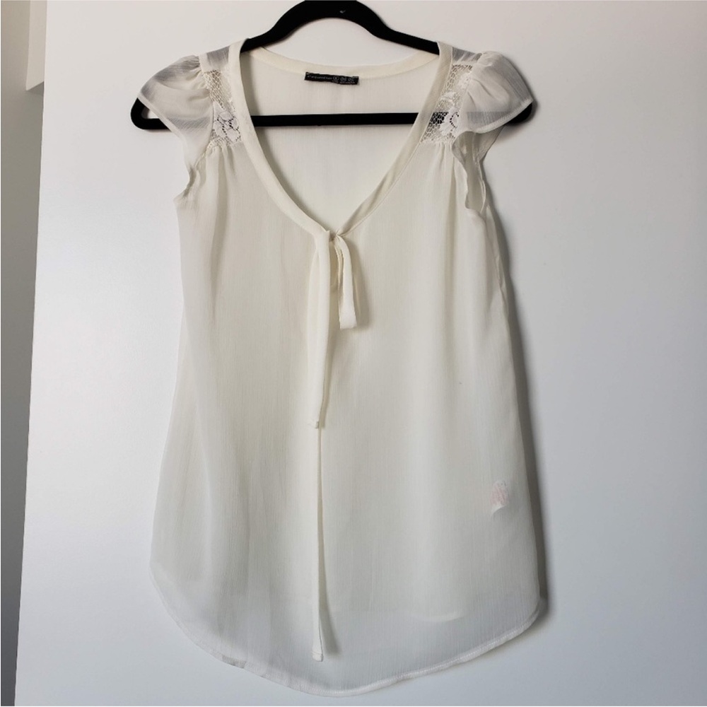 Sheer cream top with delicate lace cap sleeves